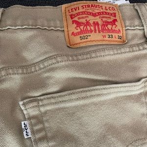 Levi’s 502 men’s 33x32 taper fit beige/brown/khaki colored heavy twill pants